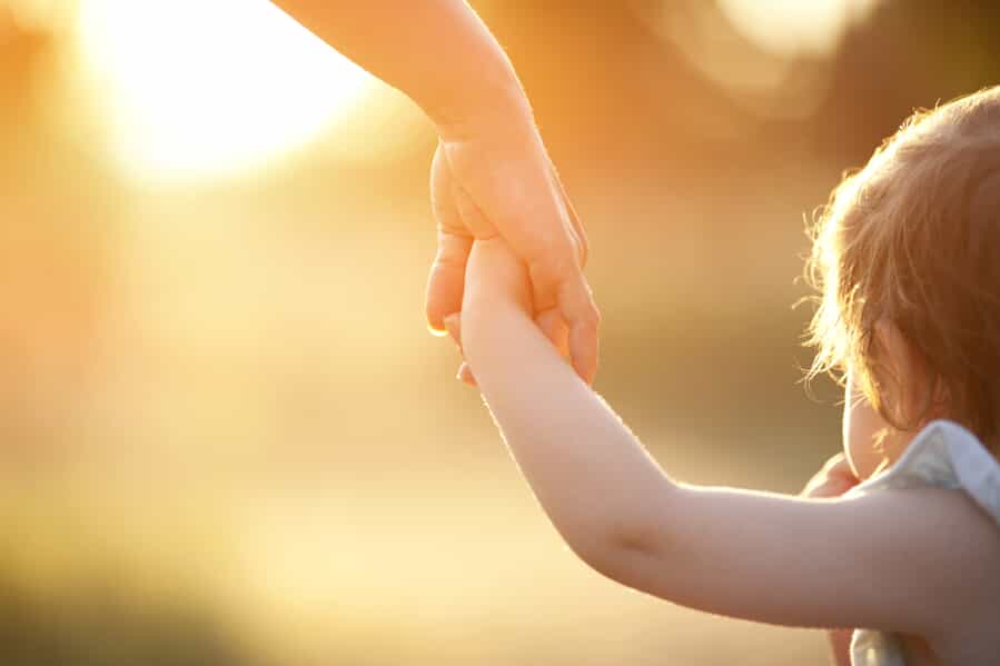 Parent Holding Child's Hand